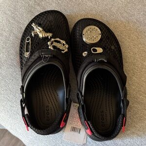 CROCS Black and Red Homing pigeon all terrain Clogs
